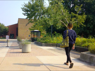 College student walks on campus.